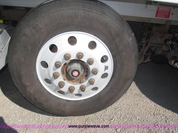 image for item F7115 2001 Freightliner FLD120 tri axle dump truck