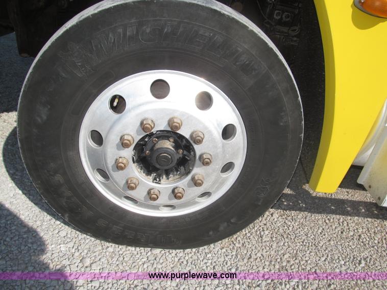 image for item F7115 2001 Freightliner FLD120 tri axle dump truck