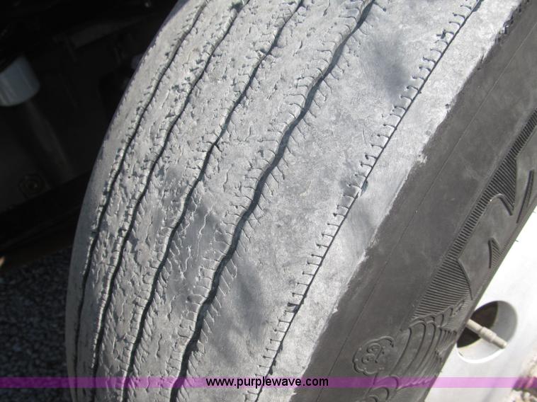 image for item F7115 2001 Freightliner FLD120 tri axle dump truck