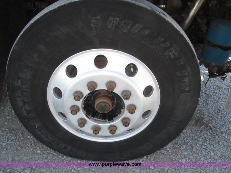 image for item F7115 2001 Freightliner FLD120 tri axle dump truck