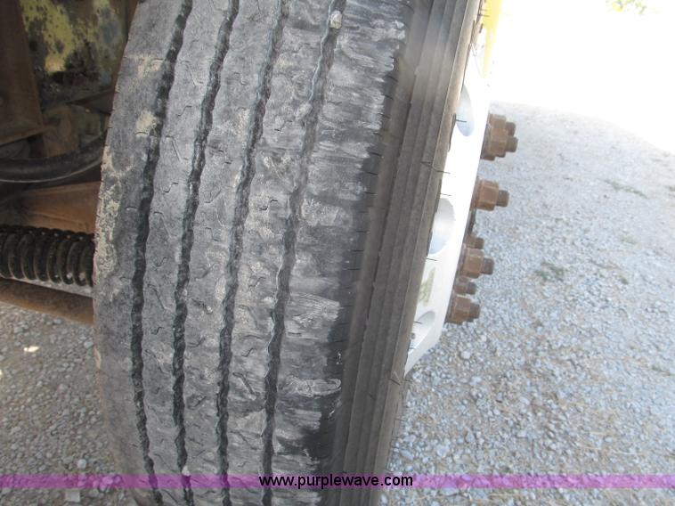 image for item F7115 2001 Freightliner FLD120 tri axle dump truck