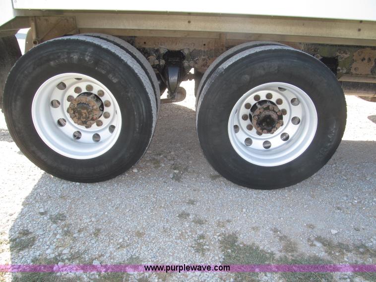 image for item F7115 2001 Freightliner FLD120 tri axle dump truck