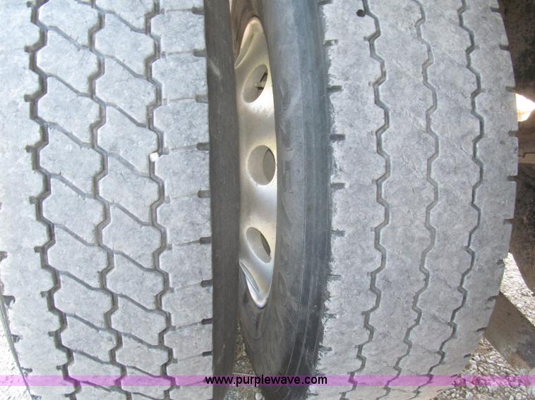 image for item F7115 2001 Freightliner FLD120 tri axle dump truck