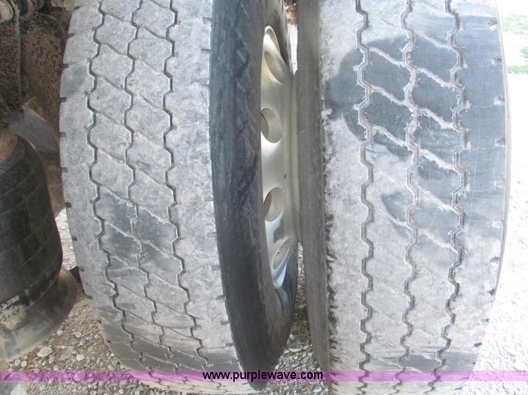 image for item F7115 2001 Freightliner FLD120 tri axle dump truck