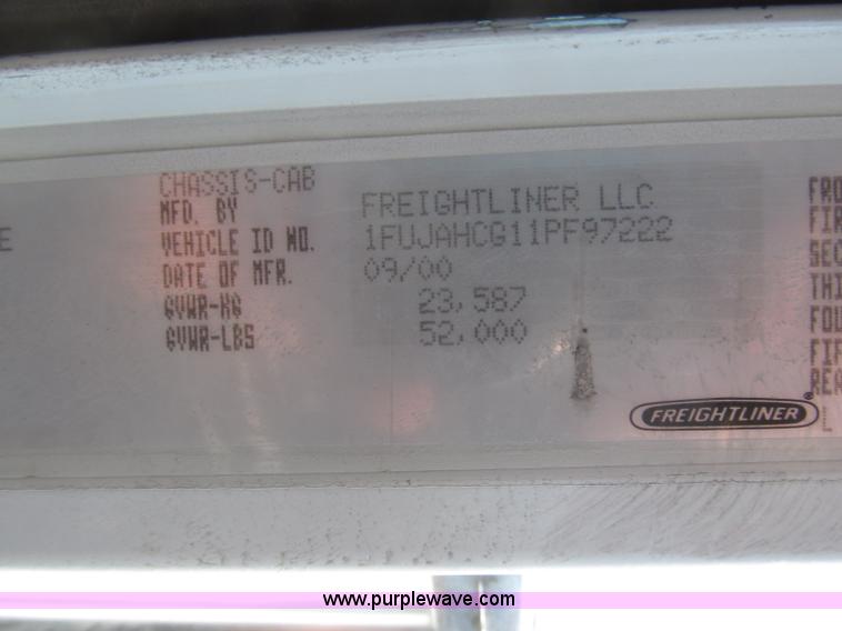 image for item F7115 2001 Freightliner FLD120 tri axle dump truck