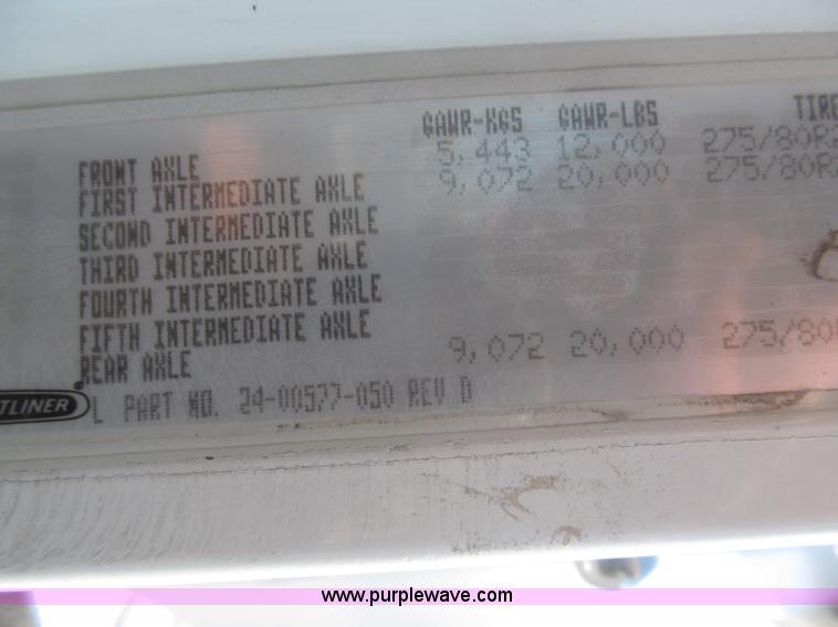 image for item F7115 2001 Freightliner FLD120 tri axle dump truck