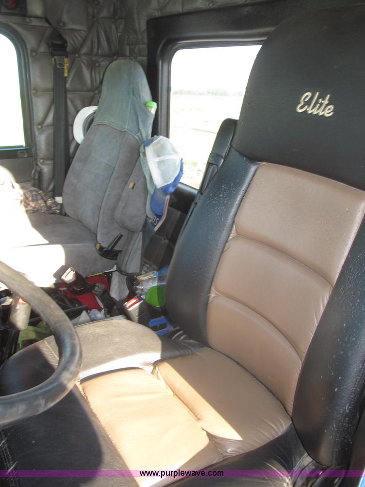 image for item F7116 2007 Freightliner FLD132 XL Classic tri axle semi truck