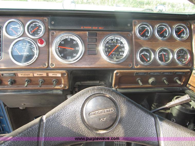 image for item F7116 2007 Freightliner FLD132 XL Classic tri axle semi truck