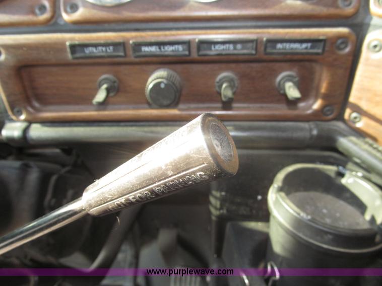 image for item F7116 2007 Freightliner FLD132 XL Classic tri axle semi truck