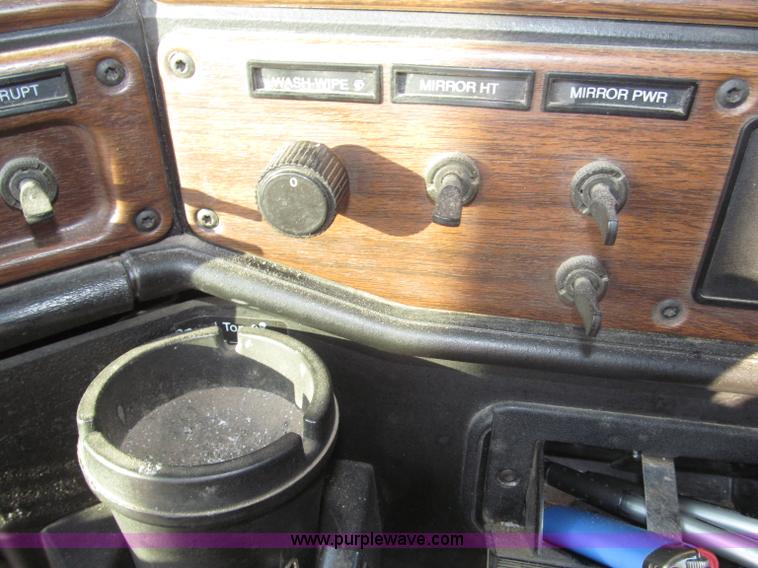 image for item F7116 2007 Freightliner FLD132 XL Classic tri axle semi truck