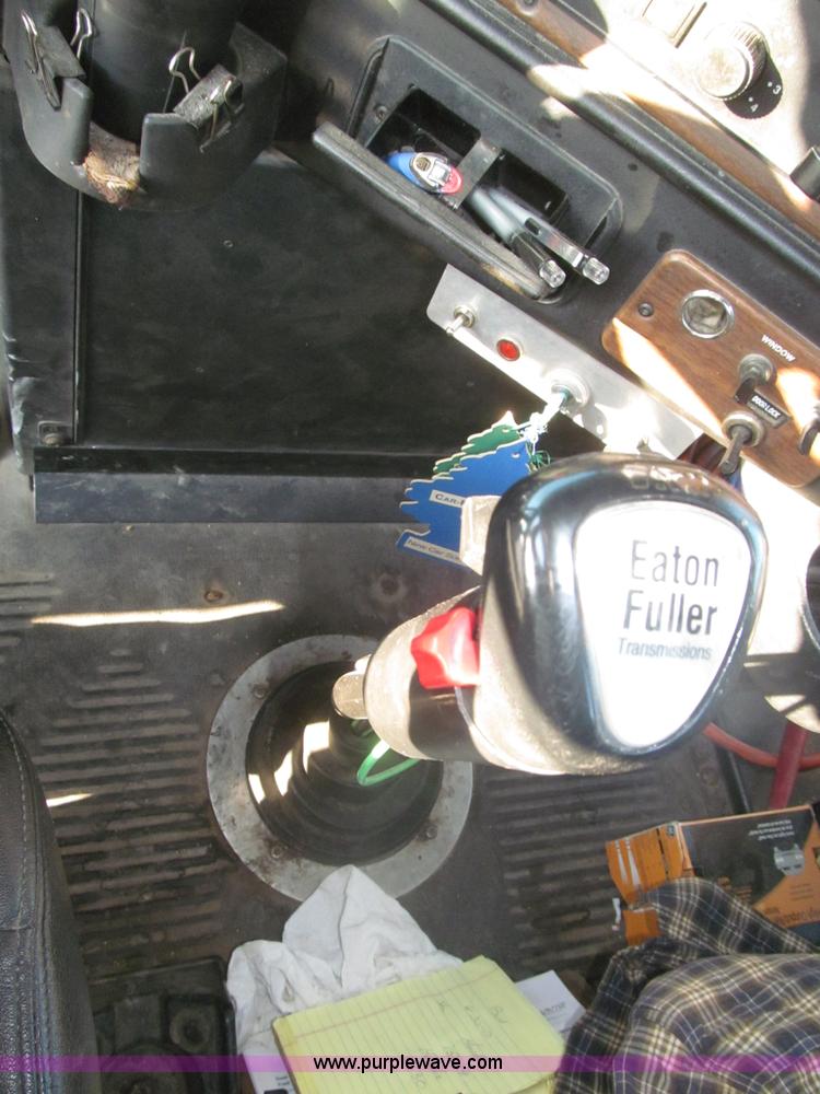 image for item F7116 2007 Freightliner FLD132 XL Classic tri axle semi truck