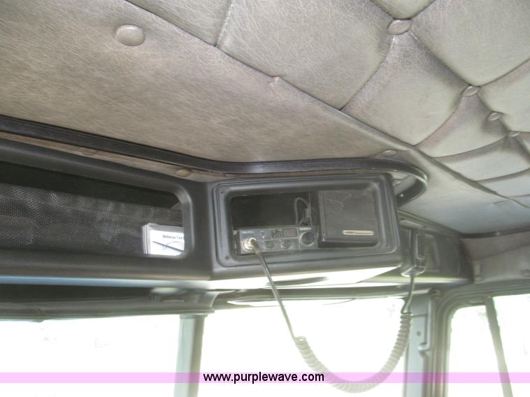 image for item F7116 2007 Freightliner FLD132 XL Classic tri axle semi truck