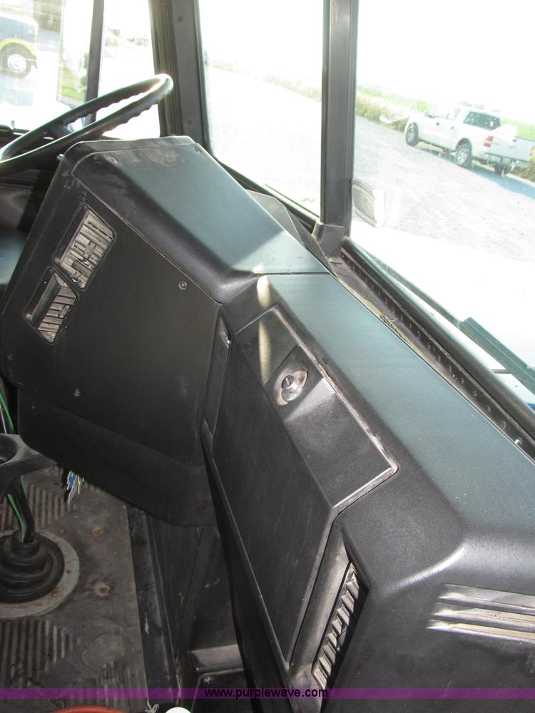 image for item F7116 2007 Freightliner FLD132 XL Classic tri axle semi truck