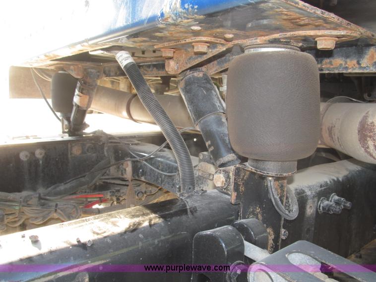 image for item F7116 2007 Freightliner FLD132 XL Classic tri axle semi truck