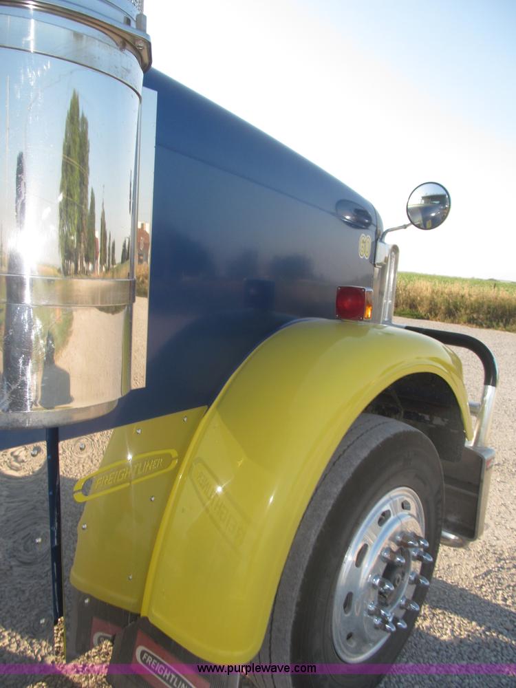 image for item F7116 2007 Freightliner FLD132 XL Classic tri axle semi truck