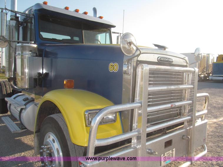 image for item F7116 2007 Freightliner FLD132 XL Classic tri axle semi truck