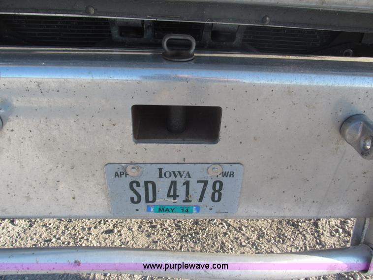 image for item F7116 2007 Freightliner FLD132 XL Classic tri axle semi truck