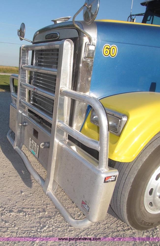 image for item F7116 2007 Freightliner FLD132 XL Classic tri axle semi truck