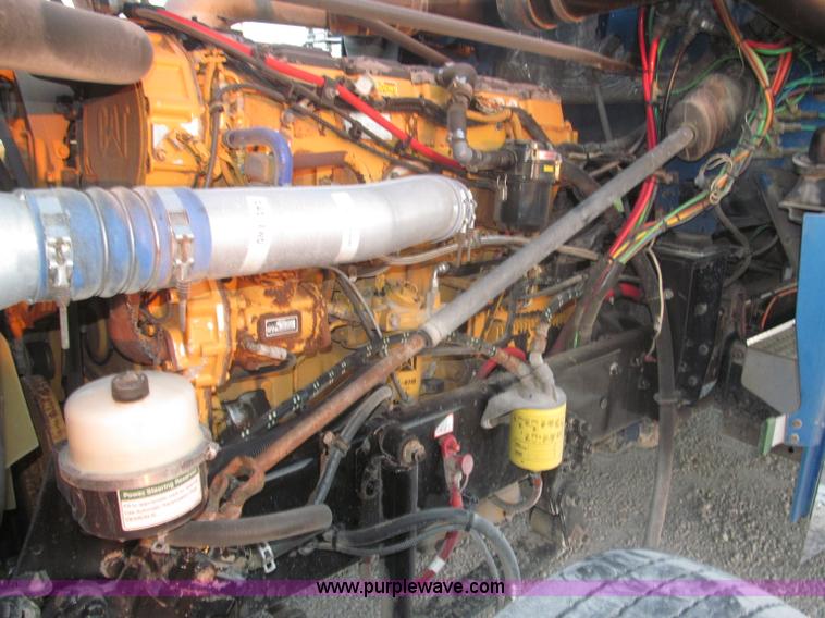 image for item F7116 2007 Freightliner FLD132 XL Classic tri axle semi truck