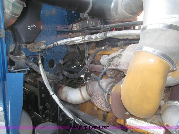 image for item F7116 2007 Freightliner FLD132 XL Classic tri axle semi truck