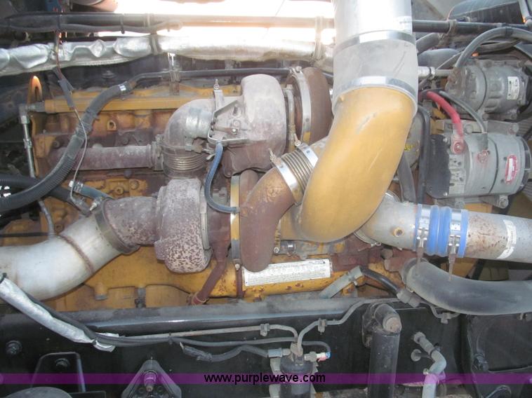 image for item F7116 2007 Freightliner FLD132 XL Classic tri axle semi truck