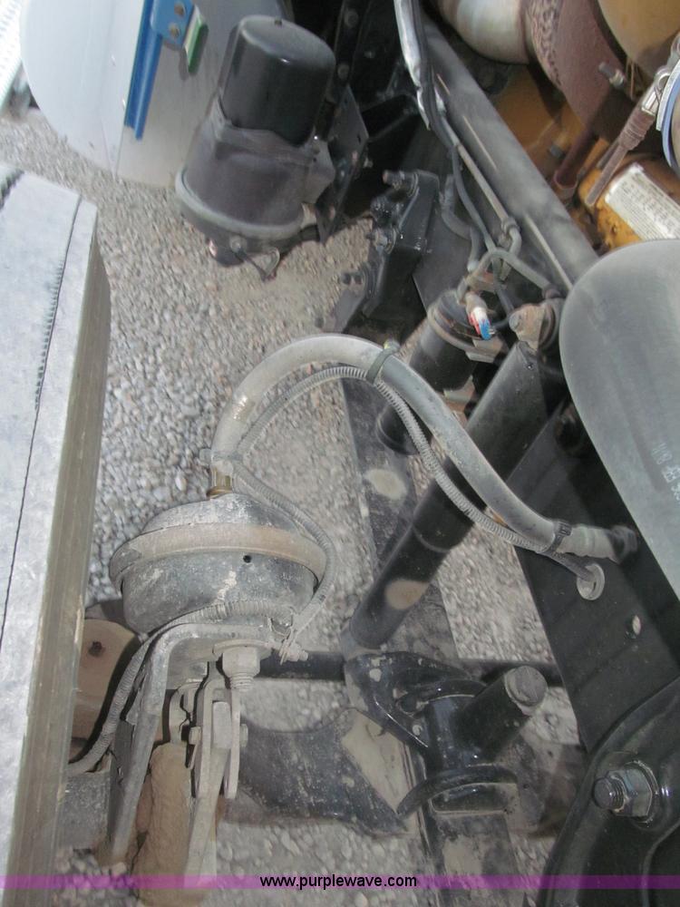 image for item F7116 2007 Freightliner FLD132 XL Classic tri axle semi truck