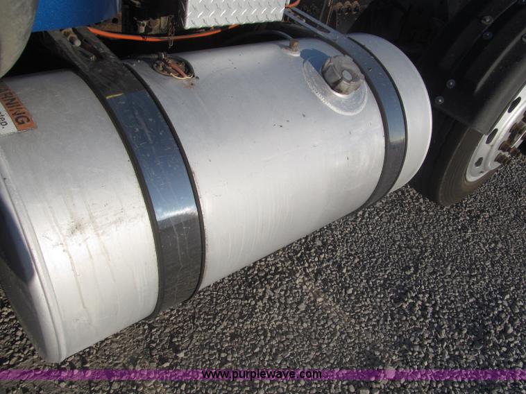 image for item F7116 2007 Freightliner FLD132 XL Classic tri axle semi truck