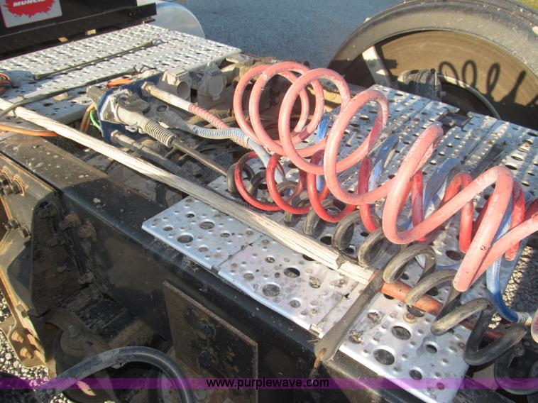 image for item F7116 2007 Freightliner FLD132 XL Classic tri axle semi truck