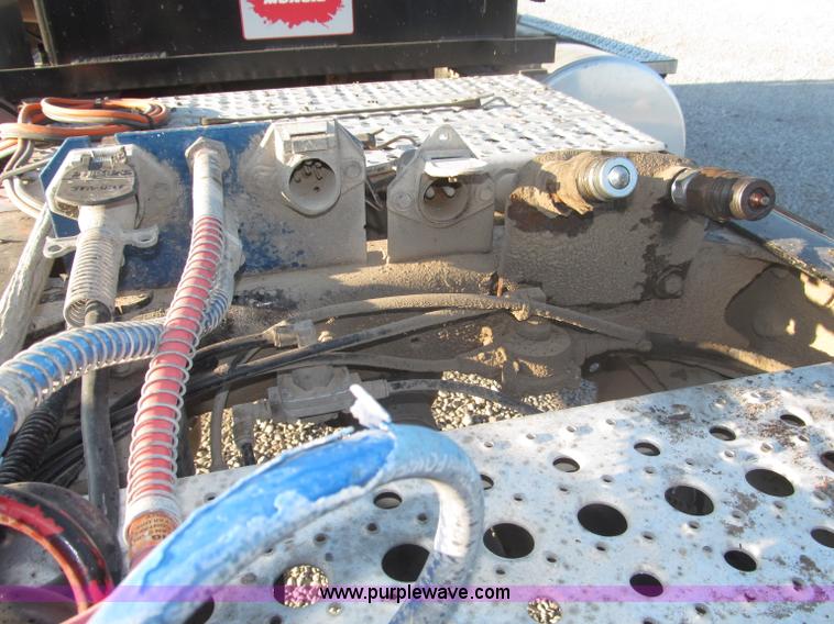 image for item F7116 2007 Freightliner FLD132 XL Classic tri axle semi truck