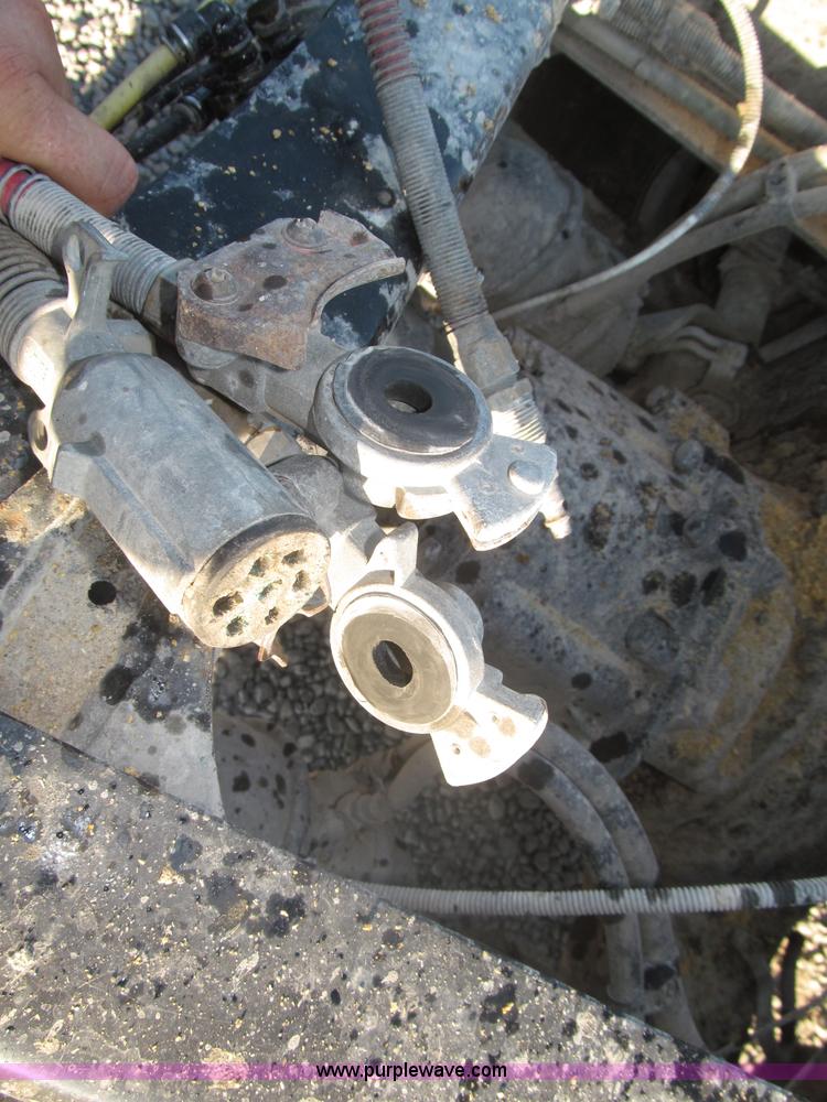 image for item F7116 2007 Freightliner FLD132 XL Classic tri axle semi truck