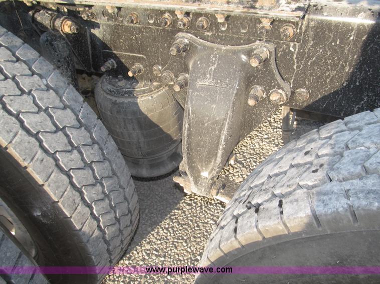 image for item F7116 2007 Freightliner FLD132 XL Classic tri axle semi truck