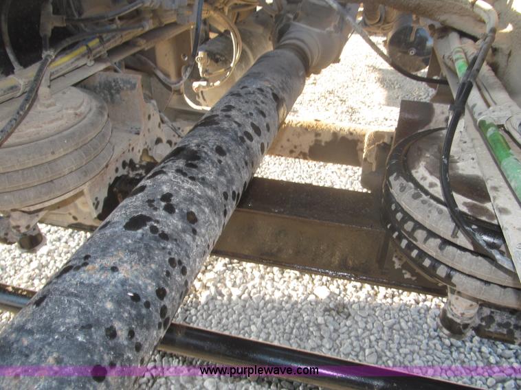 image for item F7116 2007 Freightliner FLD132 XL Classic tri axle semi truck