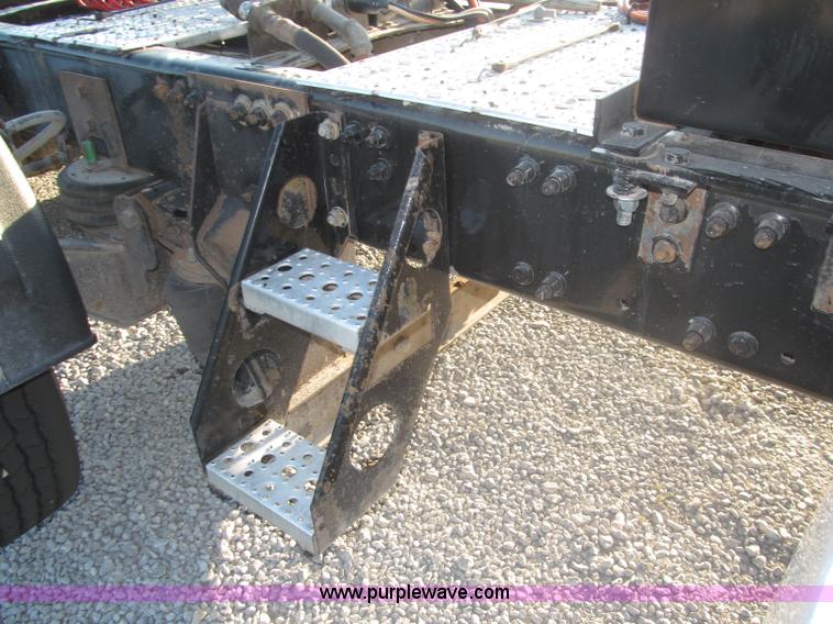 image for item F7116 2007 Freightliner FLD132 XL Classic tri axle semi truck