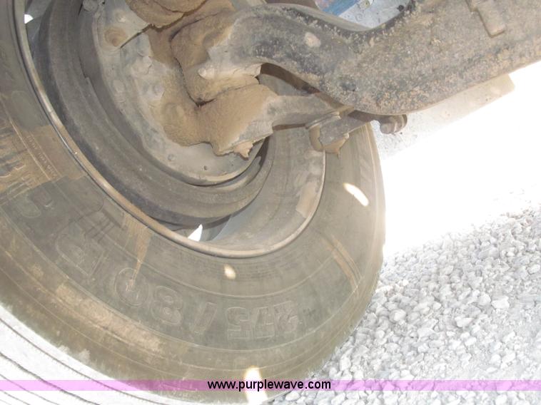 image for item F7116 2007 Freightliner FLD132 XL Classic tri axle semi truck