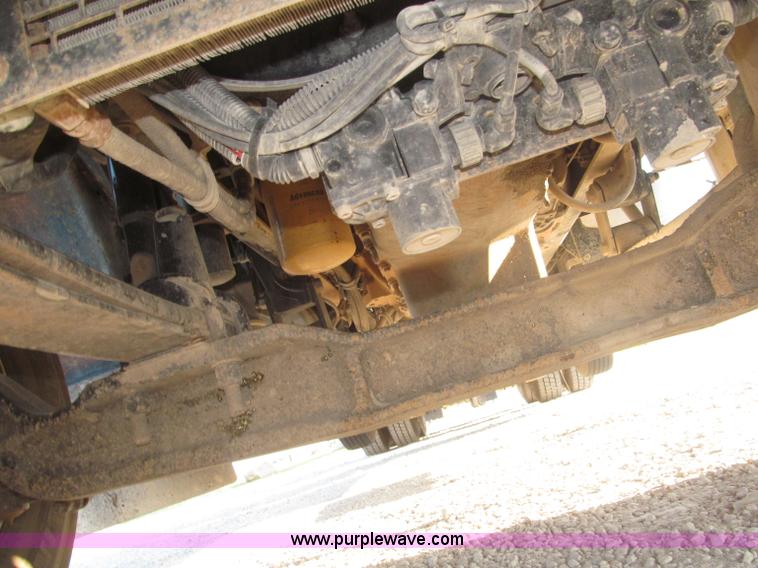 image for item F7116 2007 Freightliner FLD132 XL Classic tri axle semi truck