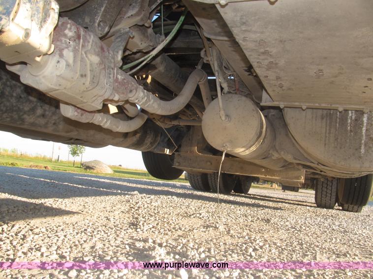 image for item F7116 2007 Freightliner FLD132 XL Classic tri axle semi truck