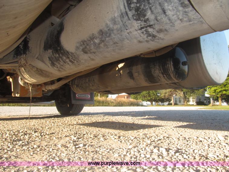 image for item F7116 2007 Freightliner FLD132 XL Classic tri axle semi truck