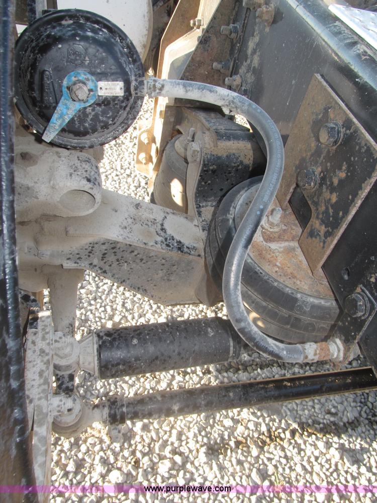 image for item F7116 2007 Freightliner FLD132 XL Classic tri axle semi truck