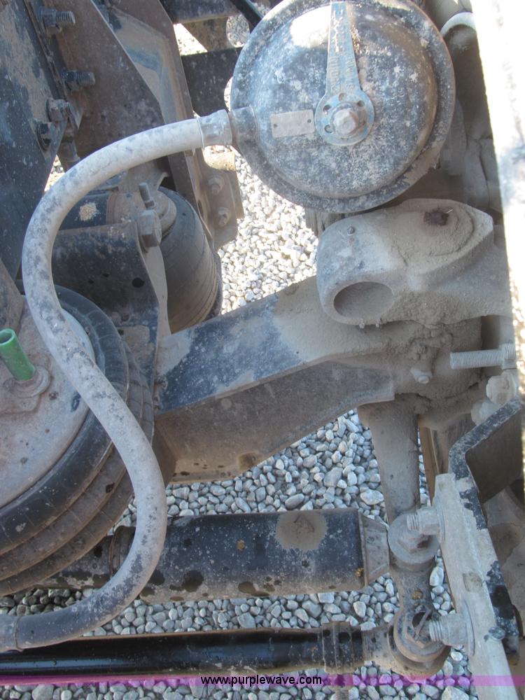 image for item F7116 2007 Freightliner FLD132 XL Classic tri axle semi truck