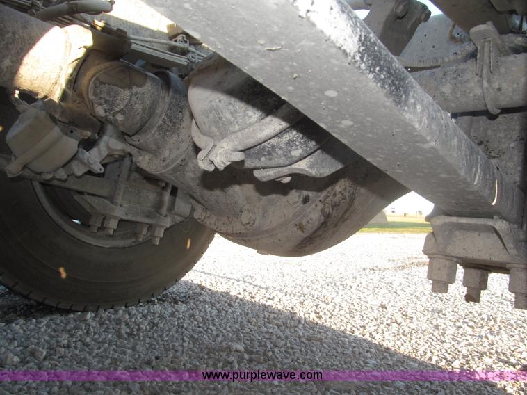 image for item F7116 2007 Freightliner FLD132 XL Classic tri axle semi truck