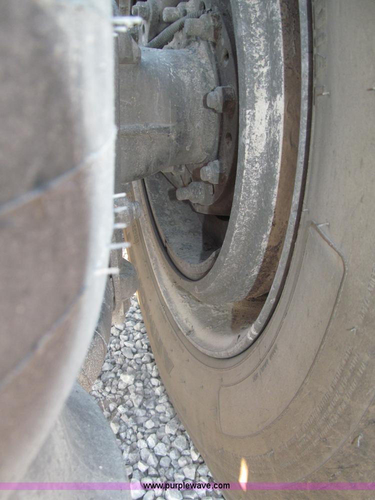 image for item F7116 2007 Freightliner FLD132 XL Classic tri axle semi truck