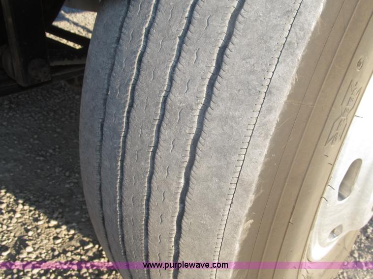 image for item F7116 2007 Freightliner FLD132 XL Classic tri axle semi truck