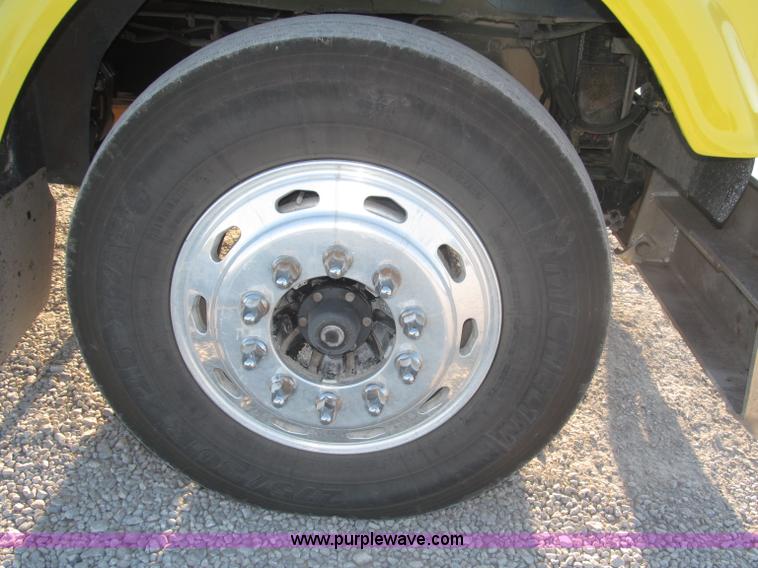 image for item F7116 2007 Freightliner FLD132 XL Classic tri axle semi truck