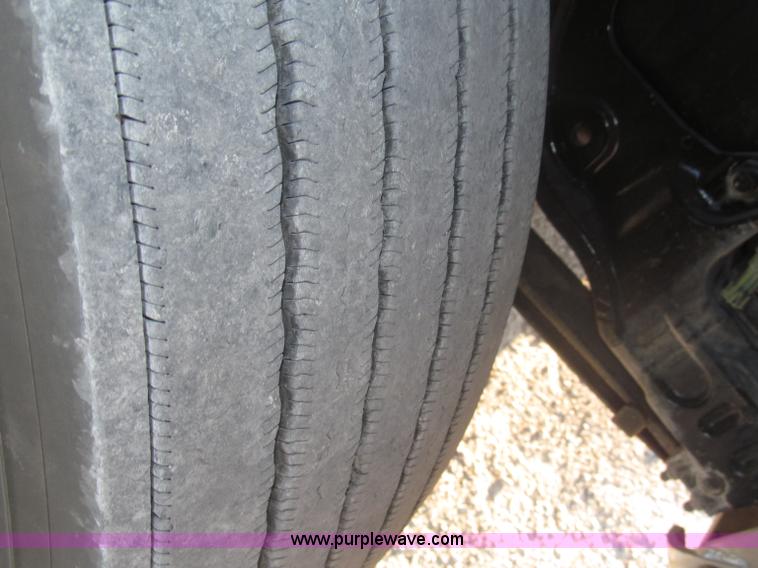 image for item F7116 2007 Freightliner FLD132 XL Classic tri axle semi truck