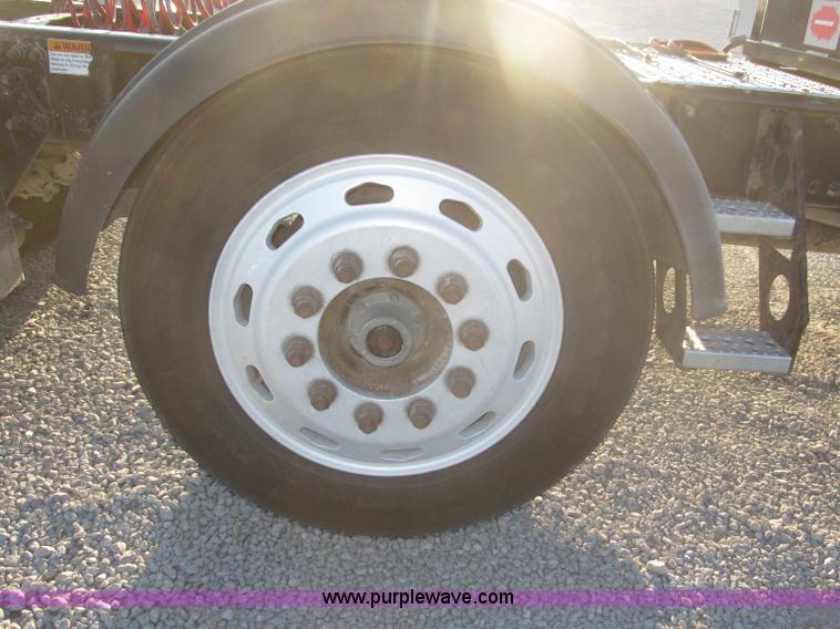 image for item F7116 2007 Freightliner FLD132 XL Classic tri axle semi truck