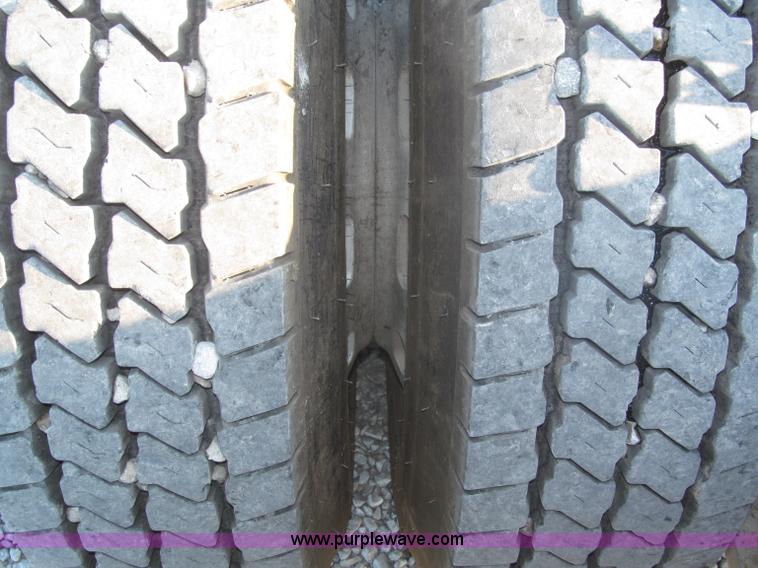 image for item F7116 2007 Freightliner FLD132 XL Classic tri axle semi truck