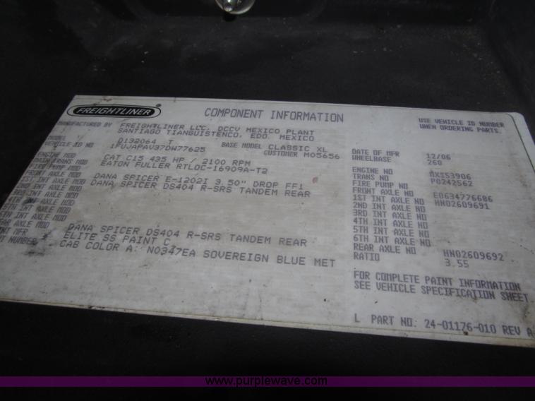 image for item F7116 2007 Freightliner FLD132 XL Classic tri axle semi truck