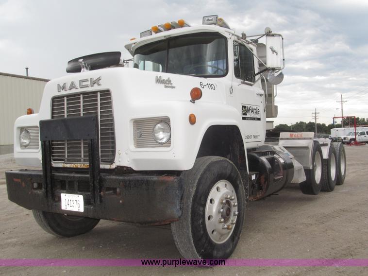 image for item F7122 1985 Mack RD688S Econodyne triple axle semi truck