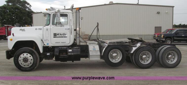image for item F7122 1985 Mack RD688S Econodyne triple axle semi truck
