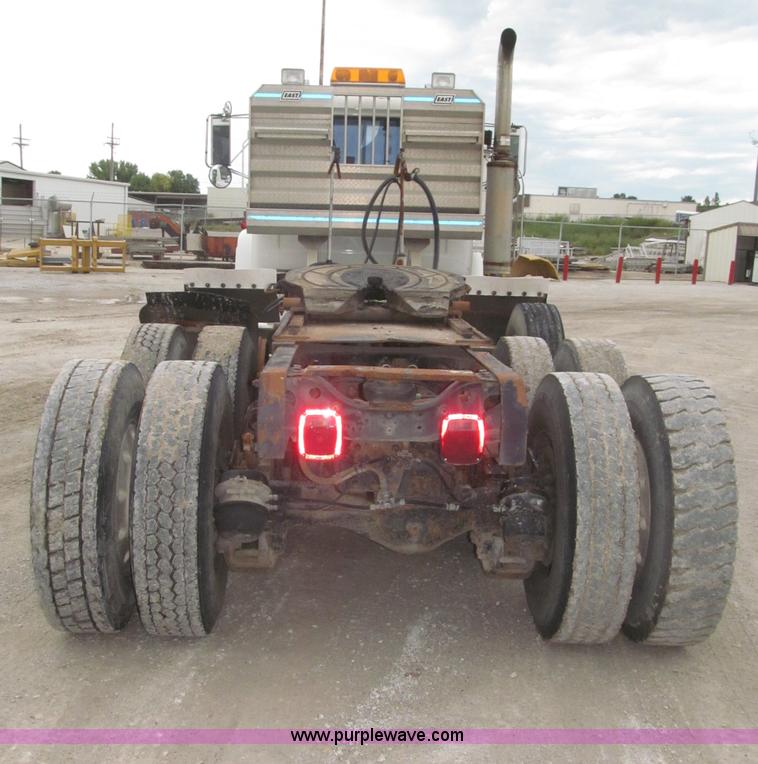 image for item F7122 1985 Mack RD688S Econodyne triple axle semi truck